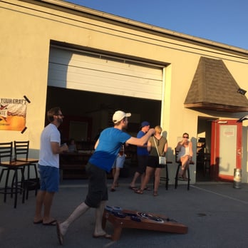 Levante Brewing Company - Owner Tim, taking in on some cornhole. I think they may have been playing for some free beer... Awesome! - Breweries Near Me - West Chester, Pennsylvania Levante Brewing Company - Owner Tim, taking in on some cornhole. I think they may have been playing for some free beer... Awesome! - Breweries Near Me - West Chester, Pennsylvania