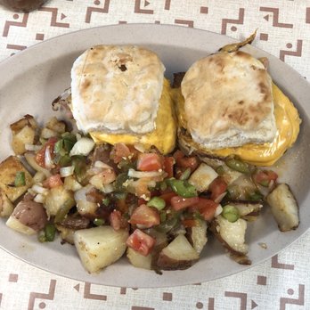 Chuck Wagon Restaurant - Biscuit breakfast sandwich and home fries with pico de gallo - Sandwiches Near Me - Miami, Florida Chuck Wagon Restaurant - Biscuit breakfast sandwich and home fries with pico de gallo - Sandwiches Near Me - Miami, Florida