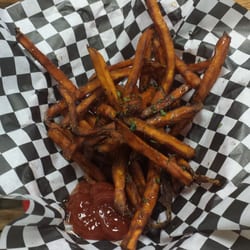 Kickin Wings - Small sweet potato fries. Has a honey drizzle which is great!