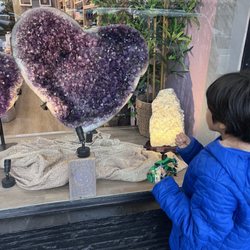 Crystal Dreams - Admiring the giant heart-shaped amethyst.