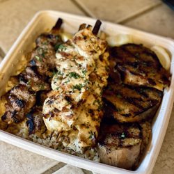 XENiA Mediterranean Kitchen - Family Style Mixed Grill with extra chicken skewers.