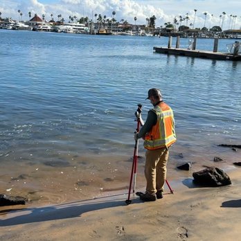 Pacific Coast Land Surveys - Collecting land survey measurements along the waterfront in Point Loma, San Diego. - Land Surveying Near Me Pacific Coast Land Surveys - Collecting land survey measurements along the waterfront in Point Loma, San Diego. - Land Surveying Near Me