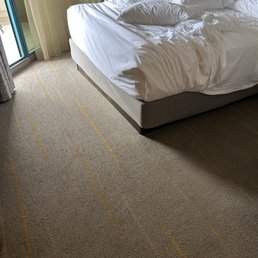 Small claustrophobic room with dirty, ugly carpeting Small claustrophobic room with dirty, ugly carpeting