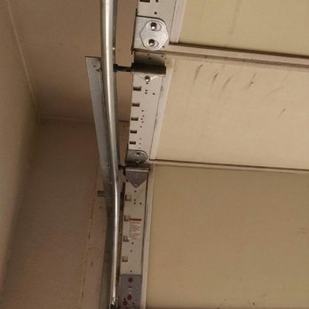 Doorability Garage Door - Bent Track - Garage Door Services Near Me Doorability Garage Door - Bent Track - Garage Door Services Near Me