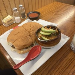 Tacos Oaxaca - Steak torta with chicken soup to warm up the soul!