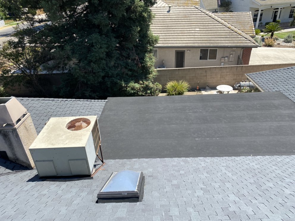 Slide of Modern Roofers and Restoration