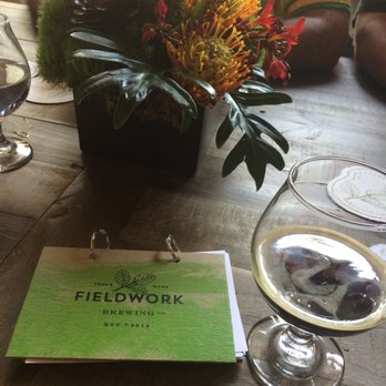 Fieldwork - Little description book of each beer and lovely Centerpieces - Breweries Near Me - Sacramento, California