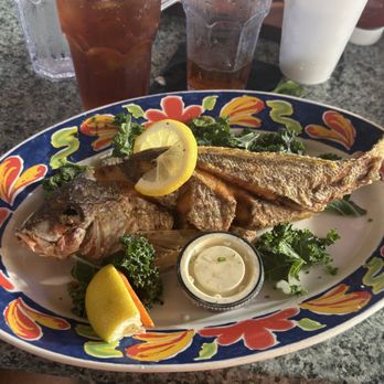Lazy Lobster Seafood Restaurant - My whole fried Yellow Tail Snapper before. - Seafood Near Me - Key Largo, Florida Lazy Lobster Seafood Restaurant - My whole fried Yellow Tail Snapper before. - Seafood Near Me - Key Largo, Florida