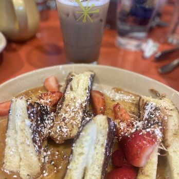 Snooze, an A.M. Eatery - OMG French Toast & Iced Oat-milk Lavender Latte & Side of bacon (not shown) - Breakfast & Brunch Near Me - Orange, California Snooze, an A.M. Eatery - OMG French Toast & Iced Oat-milk Lavender Latte & Side of bacon (not shown) - Breakfast & Brunch Near Me - Orange, California