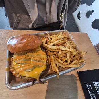 Moo'd Burger Bar - OSU burger special, onion smash patty, American cheese, pickles, moo'd sauce n fries - Burgers Near Me - Rochester, New York Moo'd Burger Bar - OSU burger special, onion smash patty, American cheese, pickles, moo'd sauce n fries - Burgers Near Me - Rochester, New York