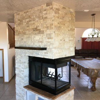 CJ & J Construction - Newly Tiled Fireplace - General Contractors Near Me