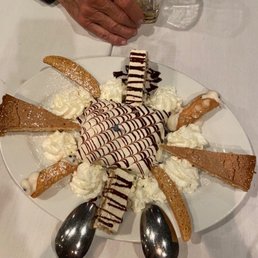 Neopoleans tiramisu biscotti and pumpkin cheesecake sampler plate was delicious