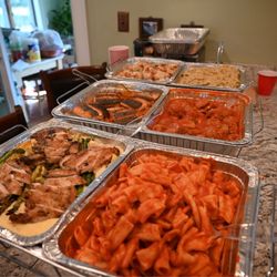 Norcina - Top row - right to left: Roasted Chicken Salmon Trapanese Knots/dipping dough Bottom row: Marinara Rigatoni meatballs Spaghetti Aglio Olio