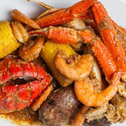 Crab & Catch - Combo C has half pound  snow crab legs, and shrimp head off with one lobster tail.