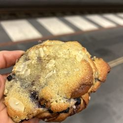 Malmö Saluhall - Berry bullen from the pastry shop. Like a mix of a cinnamon roll, an almond croissant, and a blueberry muffin all in one!