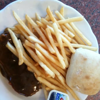 Logue's Restaurant - Tomato glazed meatloaf and brown gravy with twice-baked fries - American Near Me - Hannibal, Missouri Logue's Restaurant - Tomato glazed meatloaf and brown gravy with twice-baked fries - American Near Me - Hannibal, Missouri
