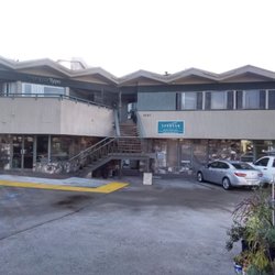 Your Optimal Health Chiropractor - You can find the entrance underneath the staircase.