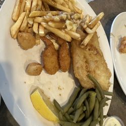 Quinte Restaurant - The fried seafood platter with a side of poutine. I had started eating.
