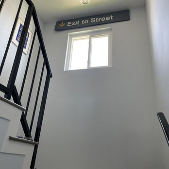 LA Builders Group - Large sign mounted at the top of a stairwell - General Contractors Near Me - Los Angeles, California LA Builders Group - Large sign mounted at the top of a stairwell - General Contractors Near Me - Los Angeles, California