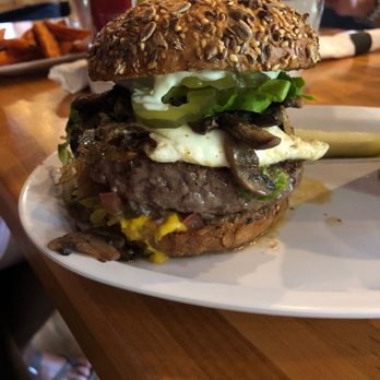 Burger District - BD's signature with egg and grilled mushrooms - Burgers Near Me - Arlington, Virginia Burger District - BD's signature with egg and grilled mushrooms - Burgers Near Me - Arlington, Virginia
