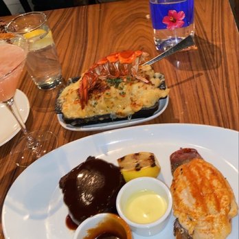 STK Steakhouse Chicago - Lobster Mac & Cheese Surf and Turf- 8 oz Filet & Lobster Tail Bottled water - Steakhouses Near Me - Chicago, Illinois STK Steakhouse Chicago - Lobster Mac & Cheese Surf and Turf- 8 oz Filet & Lobster Tail Bottled water - Steakhouses Near Me - Chicago, Illinois
