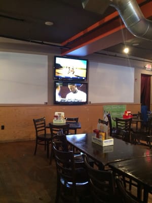 Photo of Replay Sports Bar - Milwaukee, WI, US. TV wall