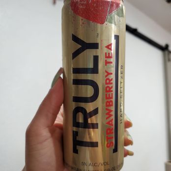 US Liquor - a person holding a can of truly strawberry tea - Beer, Wine & Spirits Near Me - Long Beach, California US Liquor - a person holding a can of truly strawberry tea - Beer, Wine & Spirits Near Me - Long Beach, California
