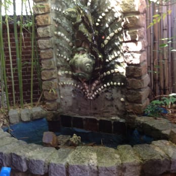 Ria's Bluebird - Fountain in the outdoor section of Ria's. There's a pig in the well of it. I do love a little pig! - Southern Near Me - Atlanta, Georgia Ria's Bluebird - Fountain in the outdoor section of Ria's. There's a pig in the well of it. I do love a little pig! - Southern Near Me - Atlanta, Georgia