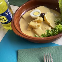 Machu Picchu - Papá a la huancaina appetizer.  Peru's traditional appetizer.  Boiled potato with hard boiled egg and their traditional sauce of aji