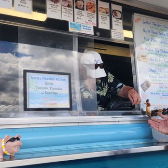 Uncle's Hawaiian Kitchen - a man serving food from a food truck - Food Trucks Near Me - Prescott Valley, Arizona Uncle's Hawaiian Kitchen - a man serving food from a food truck - Food Trucks Near Me - Prescott Valley, Arizona