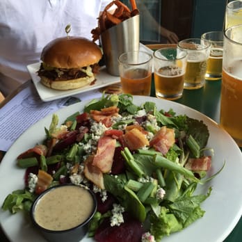 Roosterfish Pub - Yankee Pulled Pork sandwich and Warm Bacon Salad Special - Pubs Near Me - Watkins Glen, New York Roosterfish Pub - Yankee Pulled Pork sandwich and Warm Bacon Salad Special - Pubs Near Me - Watkins Glen, New York