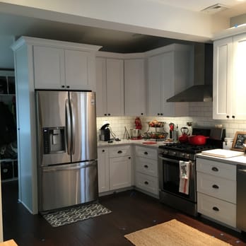 Marte Construction - a kitchen with stainless steel appliances - General Contractors Near Me