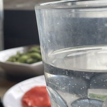 168 Sushi Japan Buffet - a glass of water and a plate of vegetables - Sushi Bars Near Me - Mississauga, Ontario