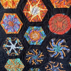 Susan K Quilting - Finished quilt top with Featheration pantograph