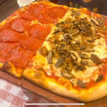Buca di Beppo Italian Restaurant - Half Pepperoni Half mushroom and Sausage - Italian Near Me - Universal City, California Buca di Beppo Italian Restaurant - Half Pepperoni Half mushroom and Sausage - Italian Near Me - Universal City, California