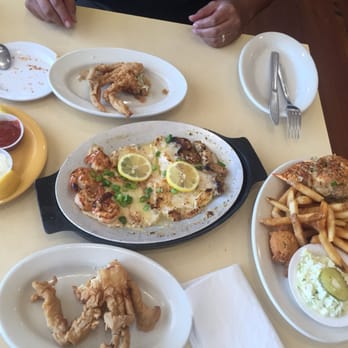 Middendorf's - Manchac - Seafood platter broiled with a side of soft shelled crab. - Seafood Near Me - Akers, Louisiana Middendorf's - Manchac - Seafood platter broiled with a side of soft shelled crab. - Seafood Near Me - Akers, Louisiana