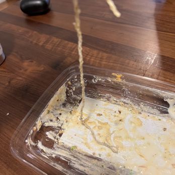 NAYA - This place is disgusting. Nearly choked on this large piece of twine in my bowl. - Lebanese Near Me - Brooklyn, New York