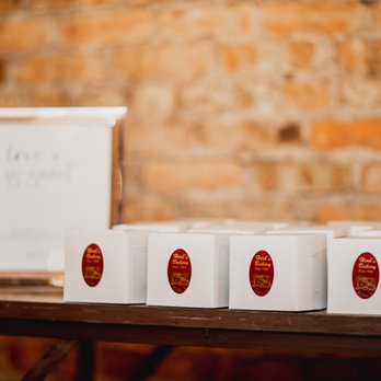 Herb's Bakery - a row of white boxes with red labels - Bakeries Near Me - Elgin, Illinois
