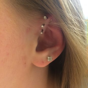 RCKT Tattoo Arts - This is the piercing I got. Called a triple helix forward. - Tattoo Near Me - Saint Paul, Minnesota RCKT Tattoo Arts - This is the piercing I got. Called a triple helix forward. - Tattoo Near Me - Saint Paul, Minnesota