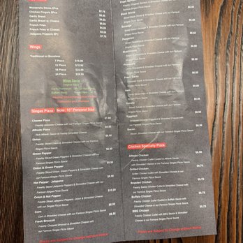 Singas Famous Pizza - a menu on a wooden table - Pizza Near Me - Camp Hill, Pennsylvania Singas Famous Pizza - a menu on a wooden table - Pizza Near Me - Camp Hill, Pennsylvania