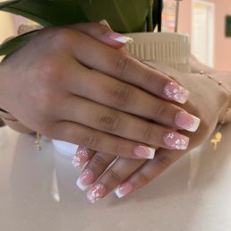 Tips and gel with floral designs Tips and gel with floral designs