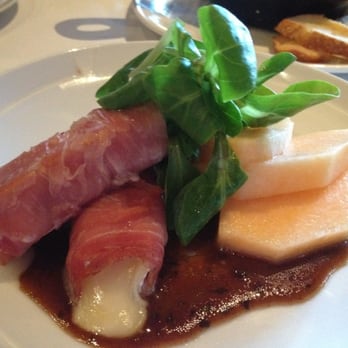 Central Park Bistro - Baked Prosciutto Wrapped Brie Cheese w/ Cantaloupe & Mission Fig Vinaigrette ($12) - New American Near Me - San Mateo, California
