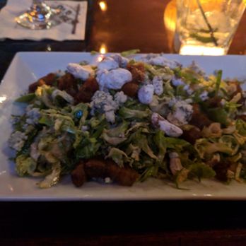 Stone Turtle - Brussel sprout salad with Bleu cheese crumbles and pecans - New American Near Me - St. Louis, Missouri Stone Turtle - Brussel sprout salad with Bleu cheese crumbles and pecans - New American Near Me - St. Louis, Missouri