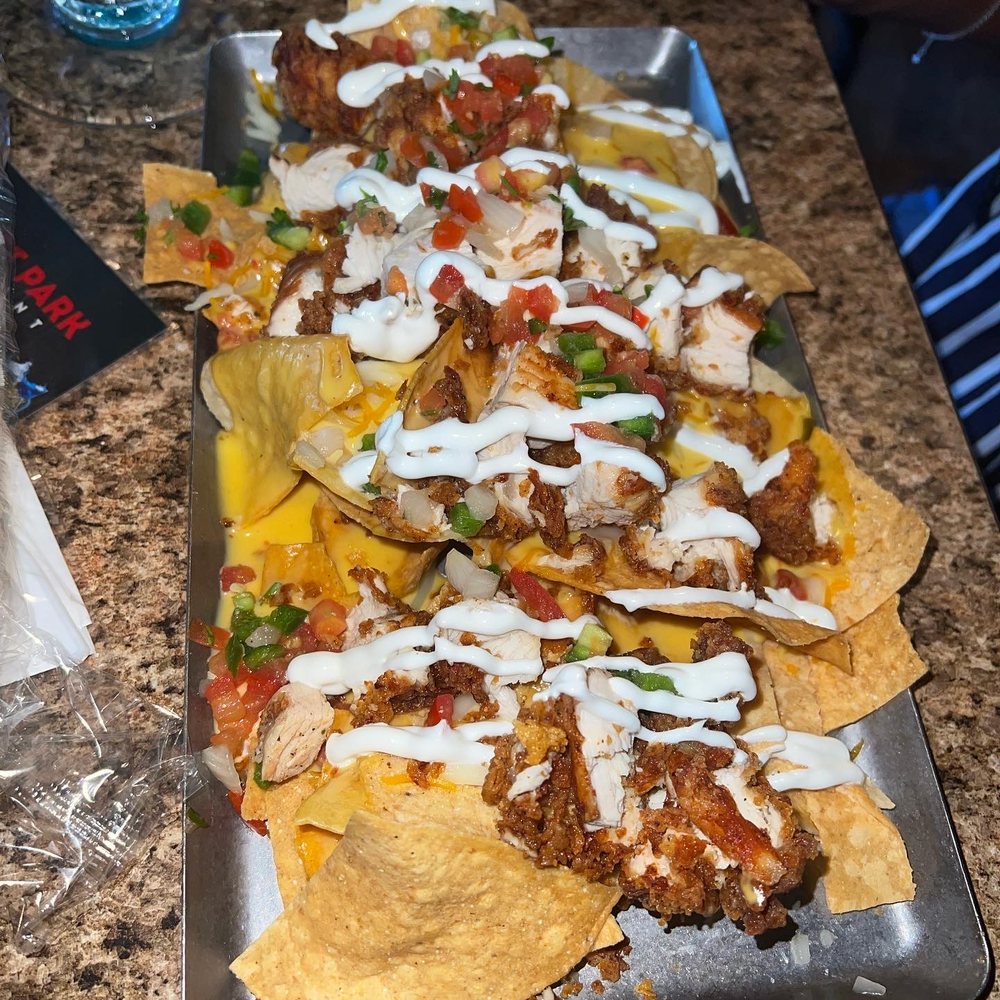 Prospect Park - loaded nachos with fried chicken - Sports Bars Near Me - Houston, Texas Prospect Park - loaded nachos with fried chicken - Sports Bars Near Me - Houston, Texas