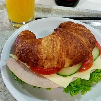 Marché Bistro - Ham and cheese croissant with OJ. - Cafes Near Me - Berlin, BE Marché Bistro - Ham and cheese croissant with OJ. - Cafes Near Me - Berlin, BE