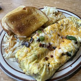 Rolling hills omelet and sourdough toast and hashbrowns