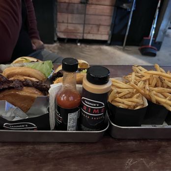 Tanner’s Prime Burgers - Burgers served with their Tanner's sauce and hot sauce - Burgers Near Me - Oceanside, California Tanner’s Prime Burgers - Burgers served with their Tanner's sauce and hot sauce - Burgers Near Me - Oceanside, California