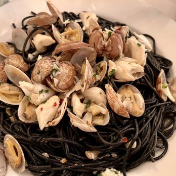 Casa Ludovico - Black spaghetti with crabmeat and clams. - Italian Near Me - Palm Harbor, Florida Casa Ludovico - Black spaghetti with crabmeat and clams. - Italian Near Me - Palm Harbor, Florida