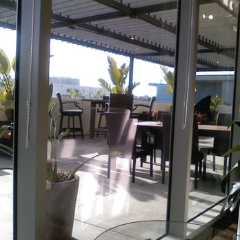Kasai Hair - View of patio from inside - Hair Salons Near Me - Manhattan Beach, California Kasai Hair - View of patio from inside - Hair Salons Near Me - Manhattan Beach, California