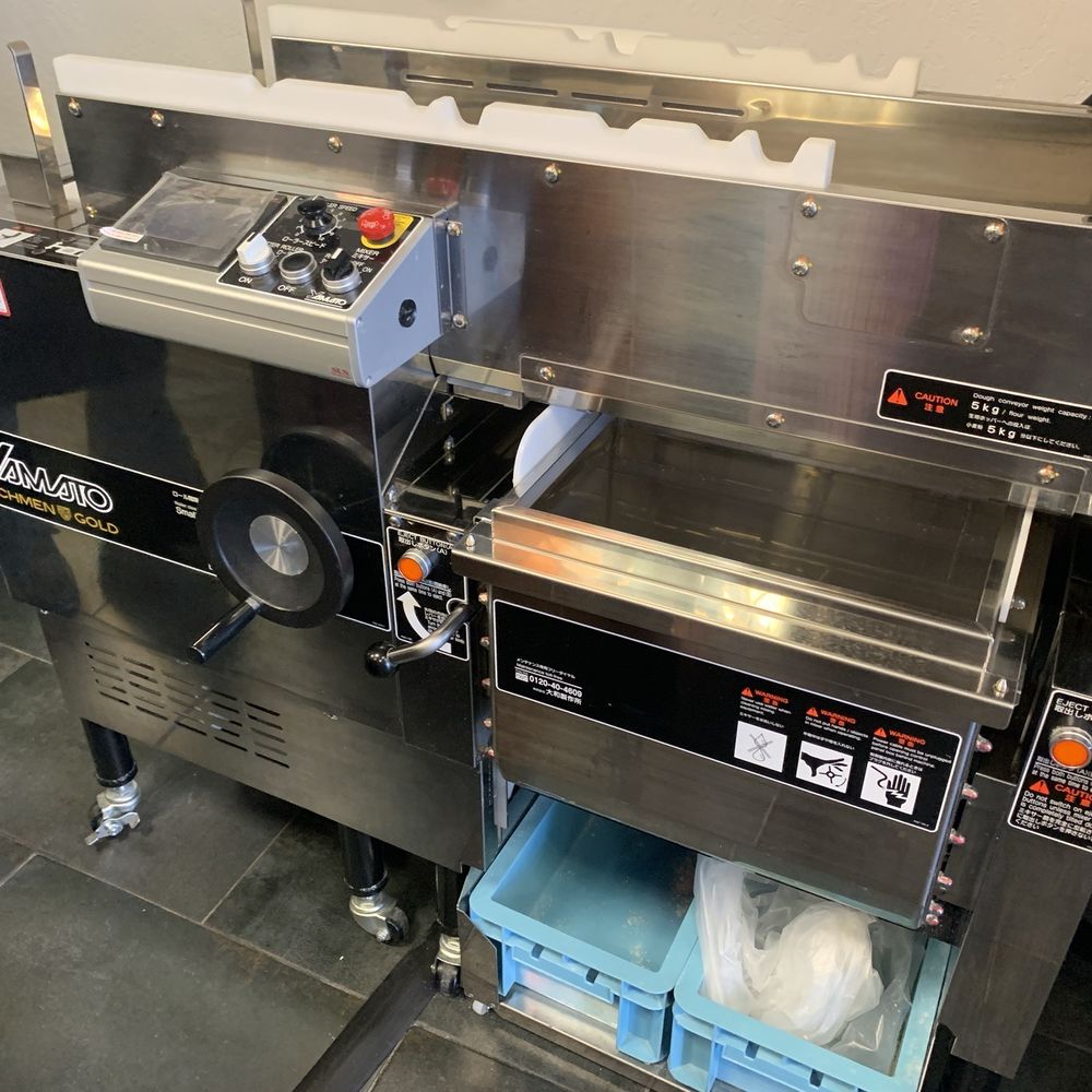 Kuma Ramen - Yamato Richmen Gold noodle and pasta maker Made in Japan that they use to make their House-made noodles - Ramen Near Me - Hanford, California Kuma Ramen - Yamato Richmen Gold noodle and pasta maker Made in Japan that they use to make their House-made noodles - Ramen Near Me - Hanford, California